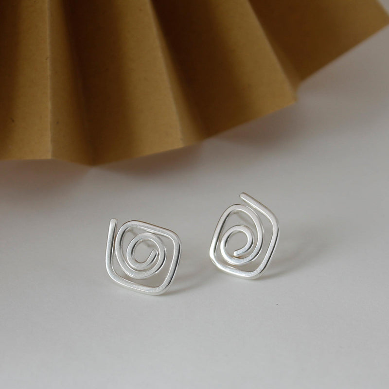 Aurelium - Diamond Swirl Stud Earrings | Silver